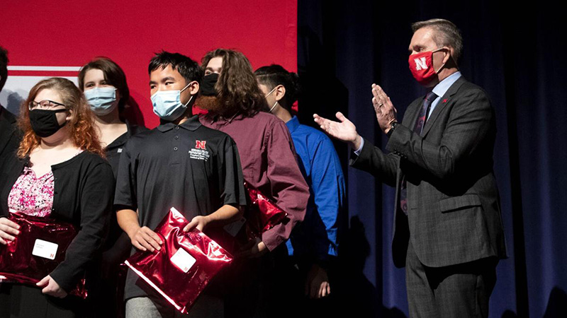 University of Nebraska-Lincoln Chancellor Ronnie Green claps for Nebraska College Preparatory Academy seniors who were awarded with certificates confirming their admission to University of Nebraska for the 2022-23 academic year at Omaha North High School on Tuesday.