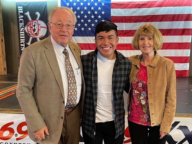Mainor Ramirez Tercero (center) attended President Carter's tailgate celebration in fall 2022 with NCPA mentors and benefactors Dr. Klaus and Gisela Hartmann.