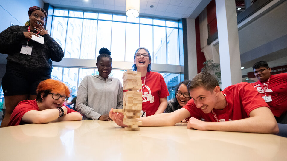 NCPA students playing jenga while attending the Summer Camp