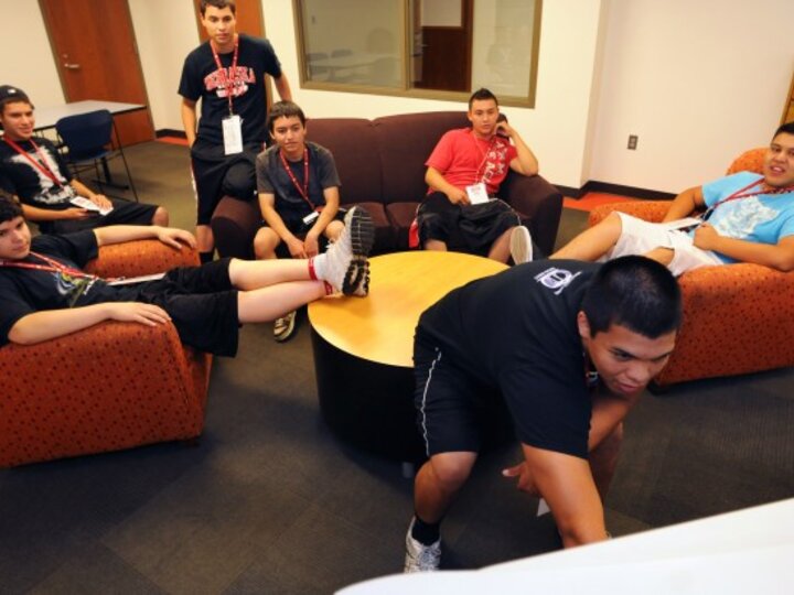 Students relax in a common room.