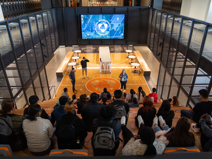 Students listening to a presentation at Hudl.
